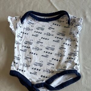 DKNY - White and Navy Baby Onesie with Airplane Design
